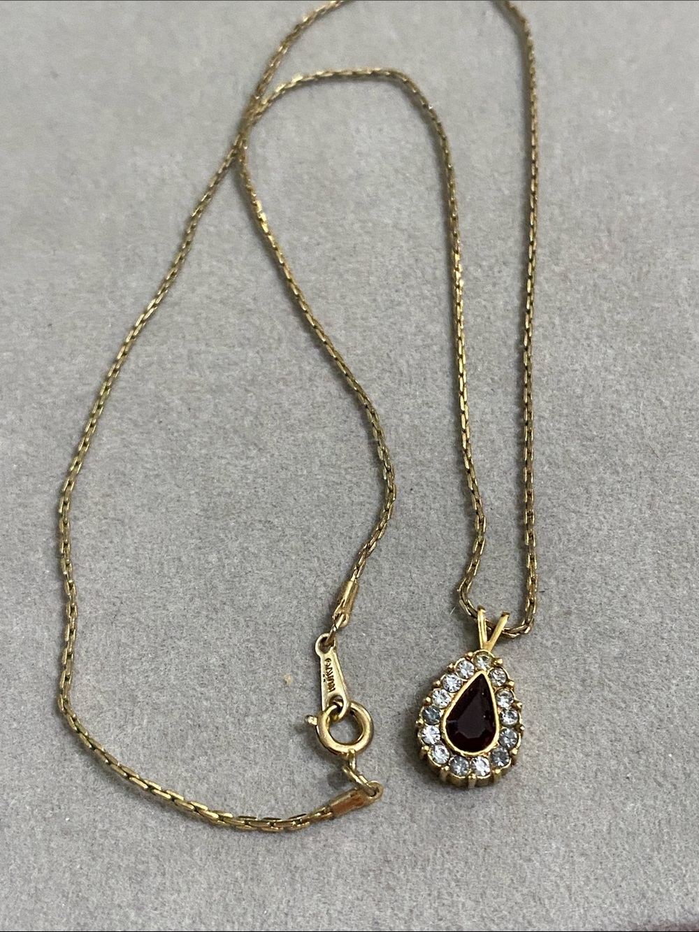 Avon Gold-Tone Teardrop Necklace with Deep Red Center and Clear Crystals